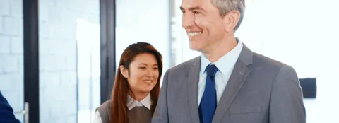 Software professionals collaborating in a modern office meeting