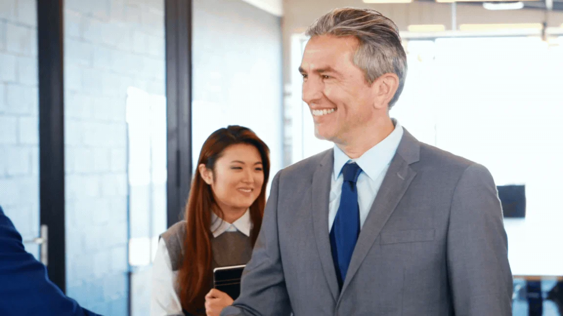 Software professionals collaborating in a modern office meeting