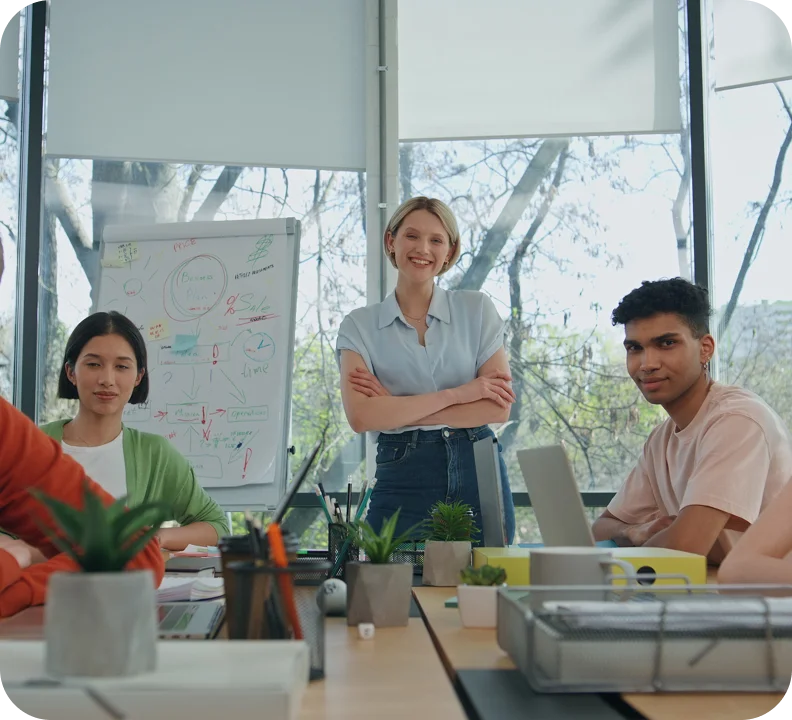 Small business team meeting around Suave CRM workspace