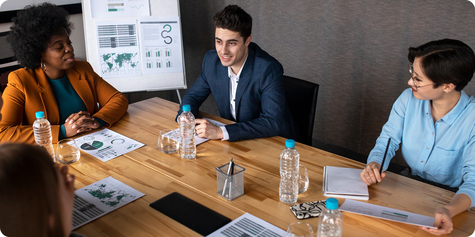Trusted diverse team aligning on client requirements with data insights
