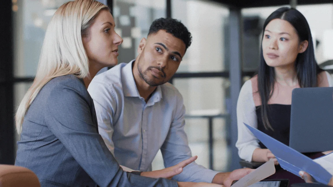 Business team collaborating on a custom software project with Suave Creators